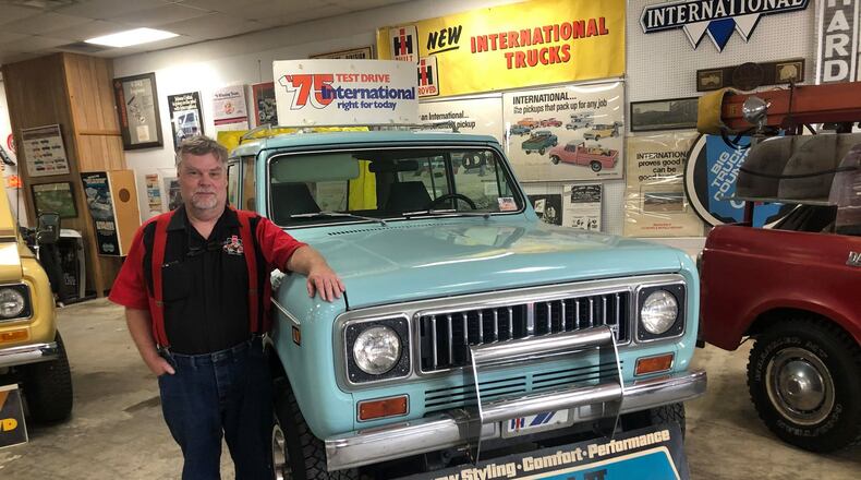 John Glancy stands beside a Scout originally owned by his late father. PAM COTTREL/CONTRIBUTOR