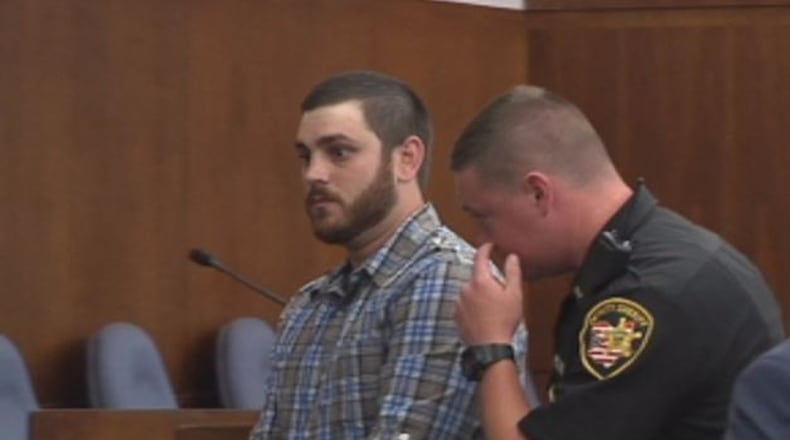 Dylan Lambert exits the courtroom on Monday after being sentenced to 10 years in prison for vehicular homicide and vehicular assault charges. STAFF PHOTO.