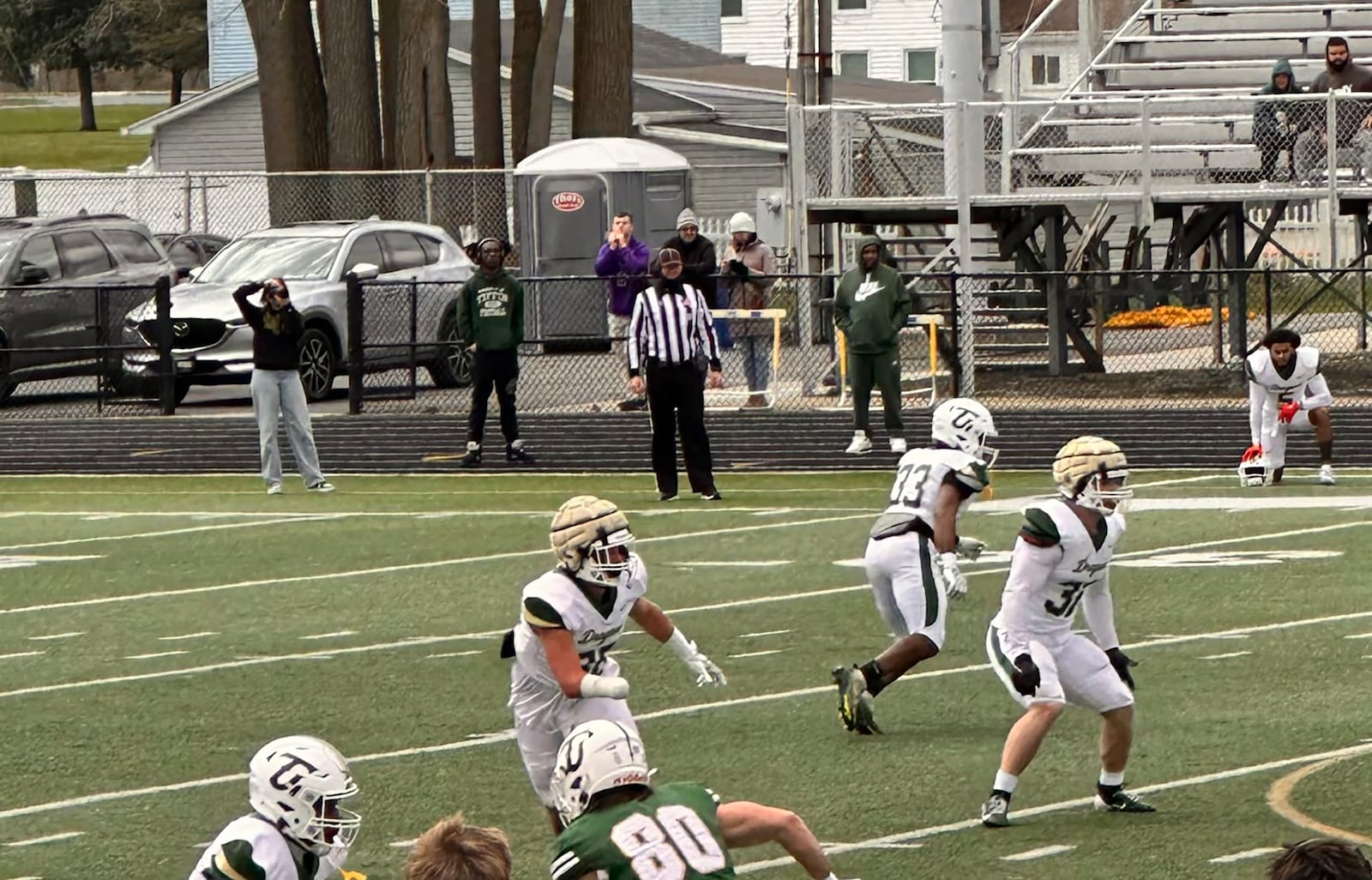 Issiah Evans (middle background) in action playing football for Tiffin University. CONTRIBUTED