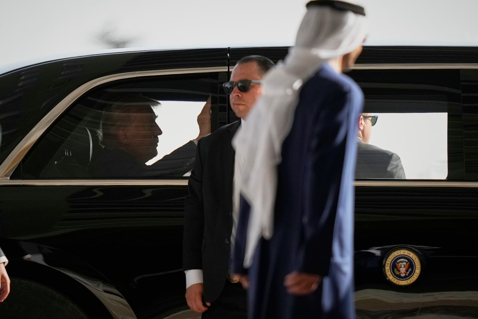 President Donald Trump leaves the airport after he was greeted by UAE President Sheikh Mohammed bin Zayed Al Nahyan at Abu Dhabi International Airport, Thursday, May 15, 2025. (AP Photo/Altaf Qadri)
