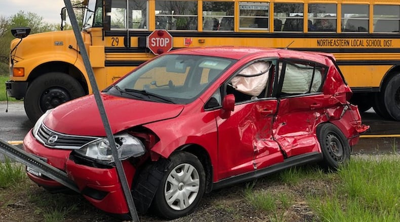 A Northeastern Local Schools District bus was involved in a two-vehicle crash involving a small car at east U.S. 40 and I-70 in Harmony Twp., Clark County, on Wednesday, May 9, 2018. BILL LACKEY / STAFF