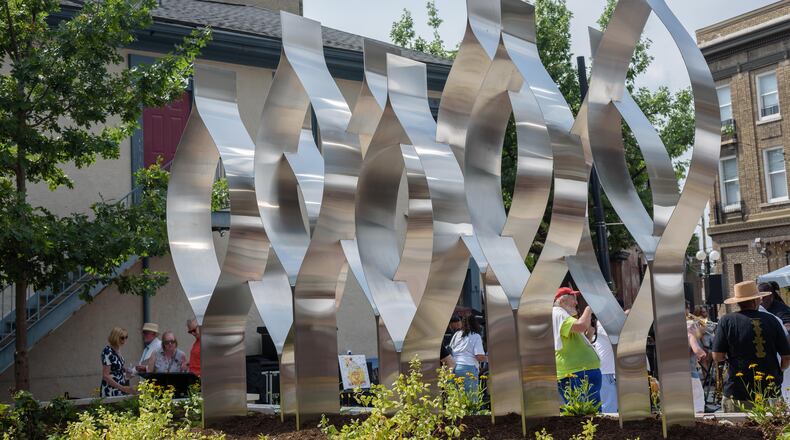 The Seed of Life Memorial, located at 530 E. Fifth St. in Dayton was unveiled on Aug. 4, 2024, five years after the mass shooting that left nine people dead and more than two dozen injured in Dayton's Oregon District. TOM GILLIAM / CONTRIBUTING PHOTOGRAPHER