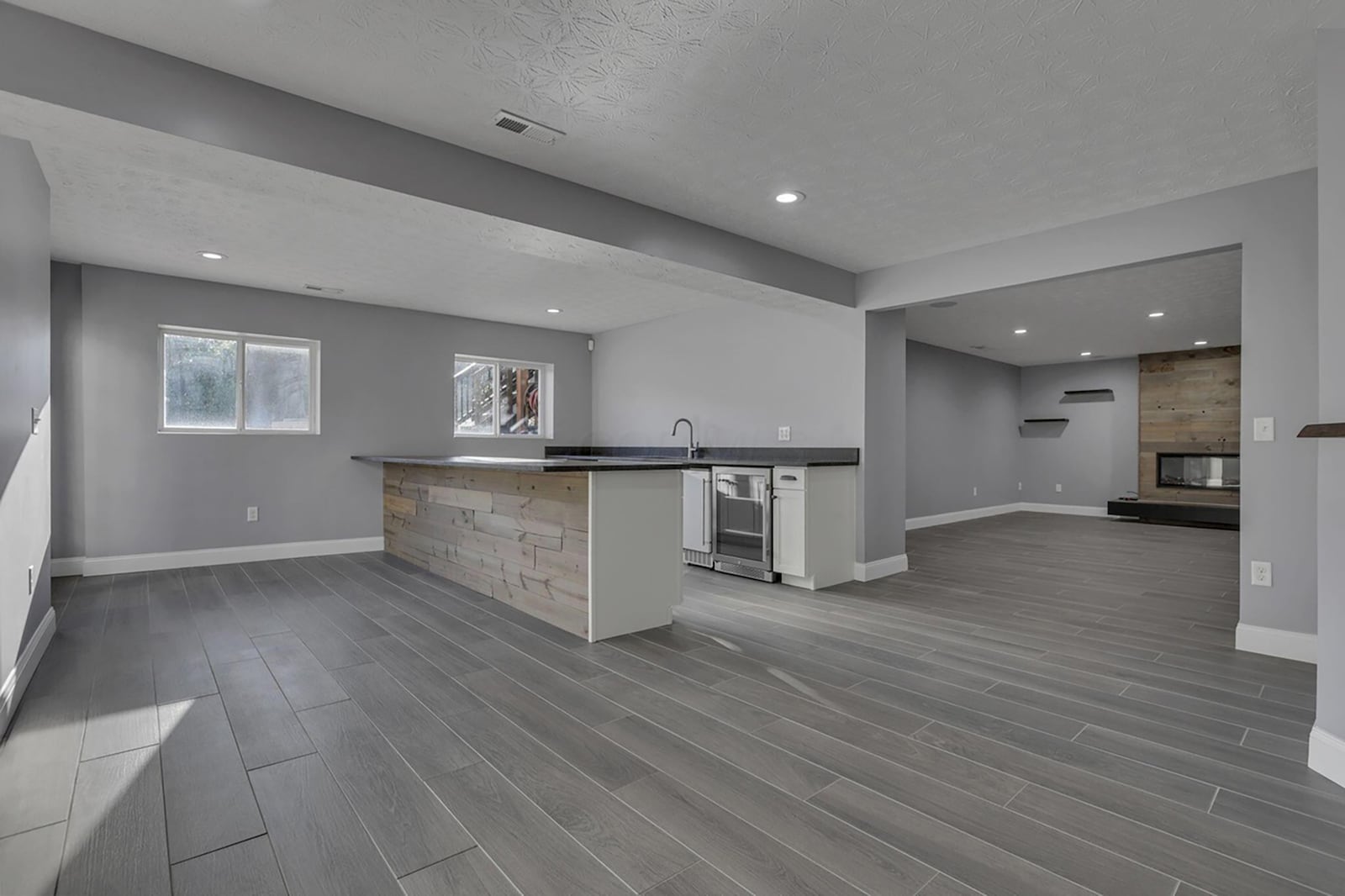 The home has a finished walk out basement with kitchenette, family room, bedroom and bathroom. CONTRIBUTED
