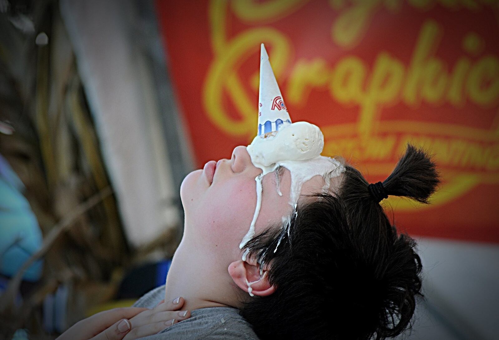 A child participates in the unicorn challenge at the New Carlisle Heritage of Flight Festival. The challenge was sponsored by Arrow Queen. MARSHALL GORBY/STAFF