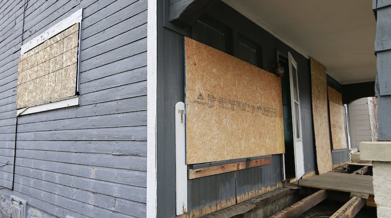 Ohio enacted the nation’s first statewide ban on mortgage lenders using plywood to board up vacant structures, which some officials hope will help disguise and stop the spread of housing abandonment and blight. Bill Lackey/Staff