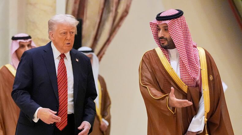 FILE - President Donald Trump arrives with Saudi Crown Prince Mohammed bin Salman for the group photo with Gulf Cooperation Council leaders during the GCC Summit in Riyadh, Saudi Arabia, May 14, 2025. (AP Photo/Alex Brandon, File)
