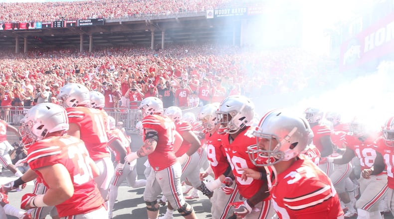 Ohio State players take the field against Bowling Green on Saturday, Sept. 3, 2016, at Ohio Stadium in Columbus. David Jablonski/Staff