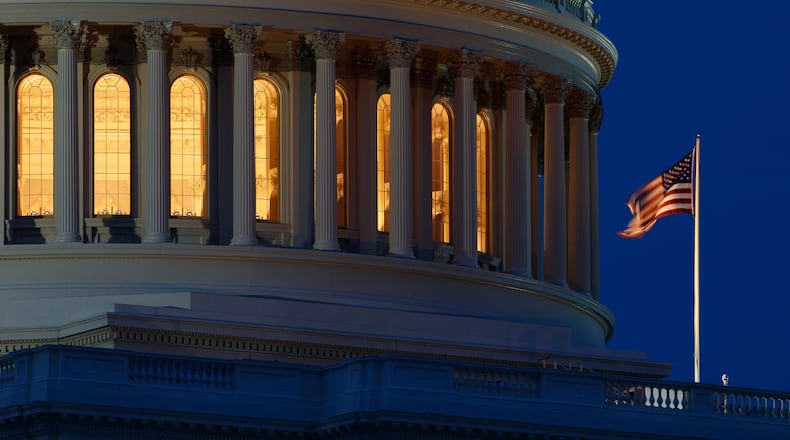 FILE - An American flag flies on the Capitol Dome in Washington on July 16, 2019. (AP Photo/Carolyn Kaster, File)
