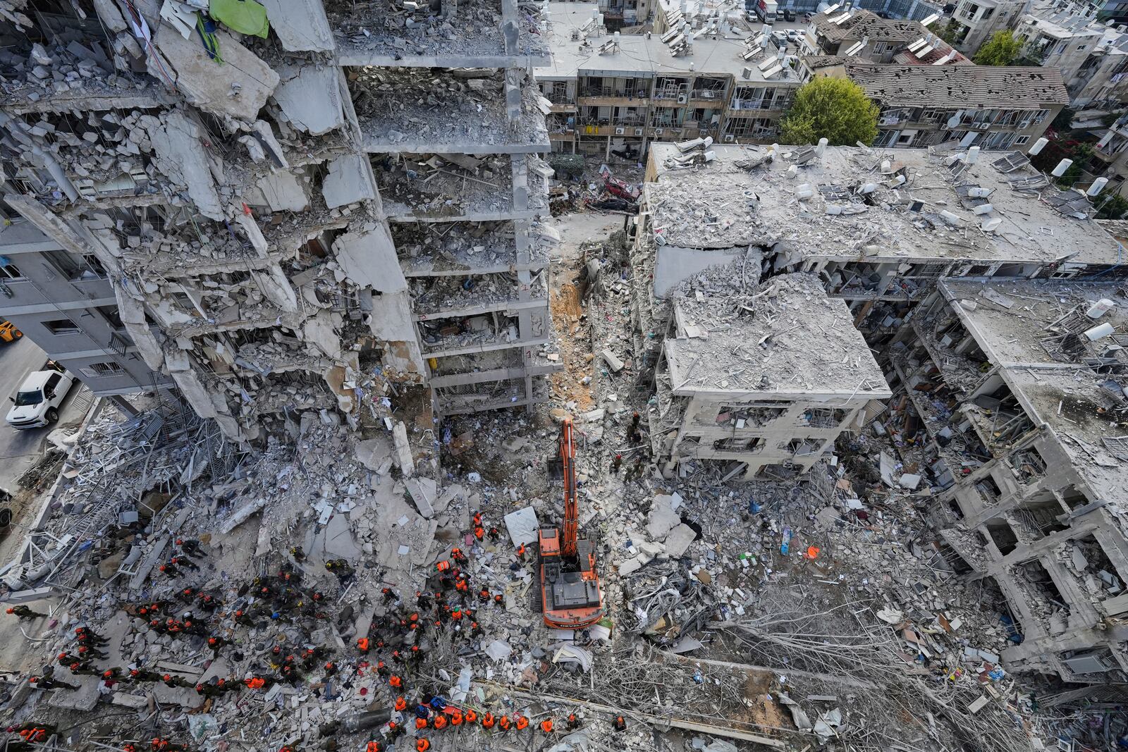 Israeli soldiers search through the rubble of residential buildings destroyed by an Iranian missile strike in Bat Yam, central Israel, on Sunday, June 15, 2025. (AP Photo/Baz Ratner)