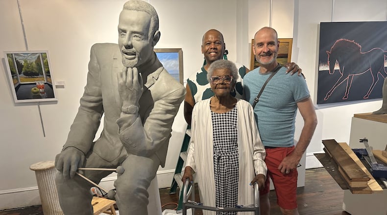The family of Springfield music legend Johnny Lytle got to view a clay model of a sculpture being created by Urbana artist Mike Major in 2024. The finished statue will be unveiled on Sunday, Oct. 12 in a ceremony outside the Clark State Performing Arts Center. CONTRIBUTED