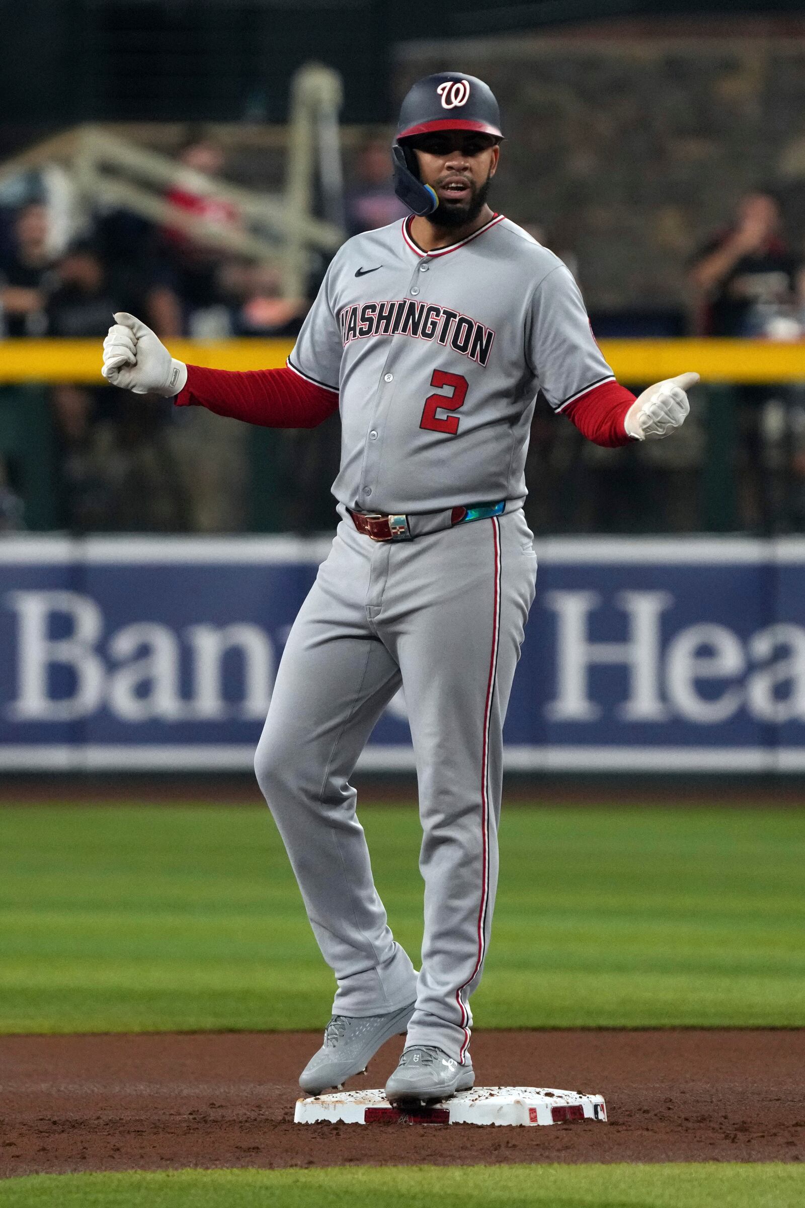 Washington Nationals' Luis García Jr. celebrates after hitting a two-run double against the Arizona Diamondbacks in the first inning during a baseball game, Saturday, May 31, 2025, in Phoenix. (AP Photo/Rick Scuteri)