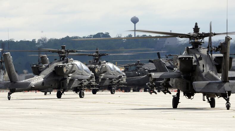 U.S. Army AH-64 Apache helicopters from the 4th Infantry Division’s 4th Combat Aviation Brigade used Wright-Patterson Air Force Base, Ohio, as a stopover May 20, 2020. The helicopters are in transit from their home post of Fort Carson, Colo., to Fort Drum, N.Y. (U.S. Air Force photo by Ty Greenlees)