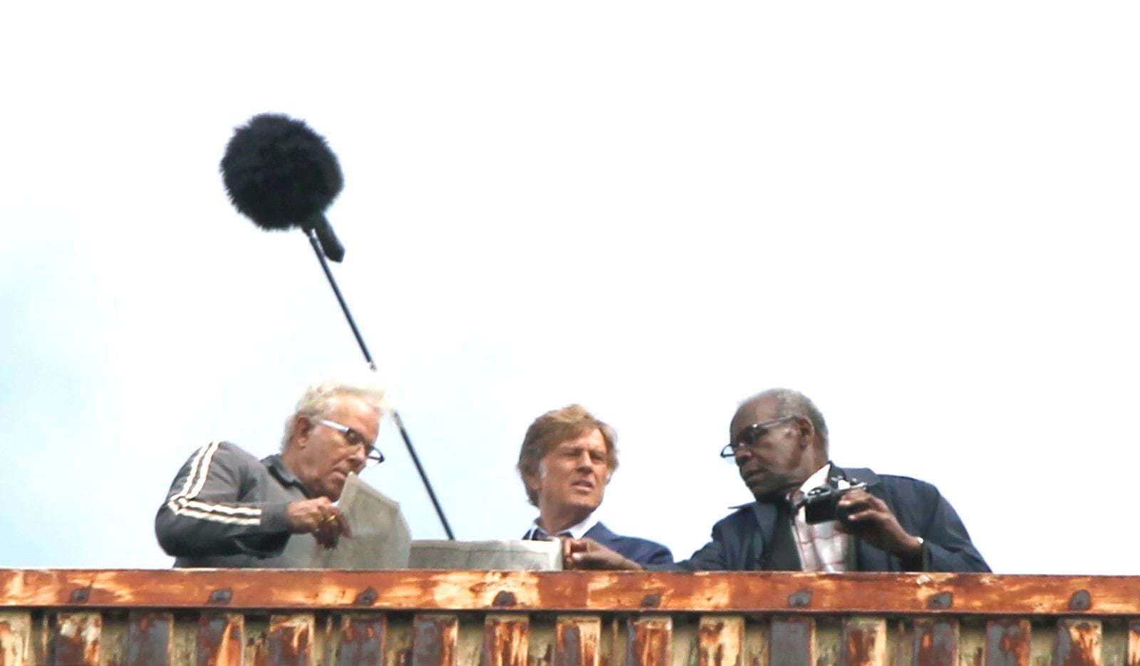 Scenes for "The Old Man and the Gun" were filmed in downtown Dayton in 2017. The movie featured Robert Redford (center) and Danny Glover (right). Filming locations included the historic Liberty Savings Bank building on West Second Street. STAFF