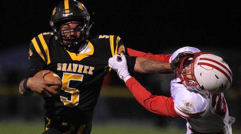 Shawnee’s Robie Glass runs against London on Friday, Oct. 18, 2019, in Springfield. David Jablonski/Staff