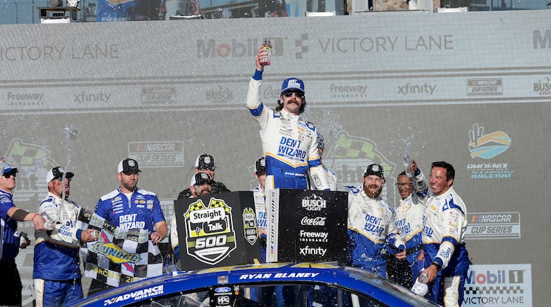 Ryan Blaney celebrates in Victory Lane after winning a NASCAR Cup Series auto race at Phoenix Raceway, Sunday, March 8, 2026, in Avondale, Ariz. (AP Photo/Darryl Webb)