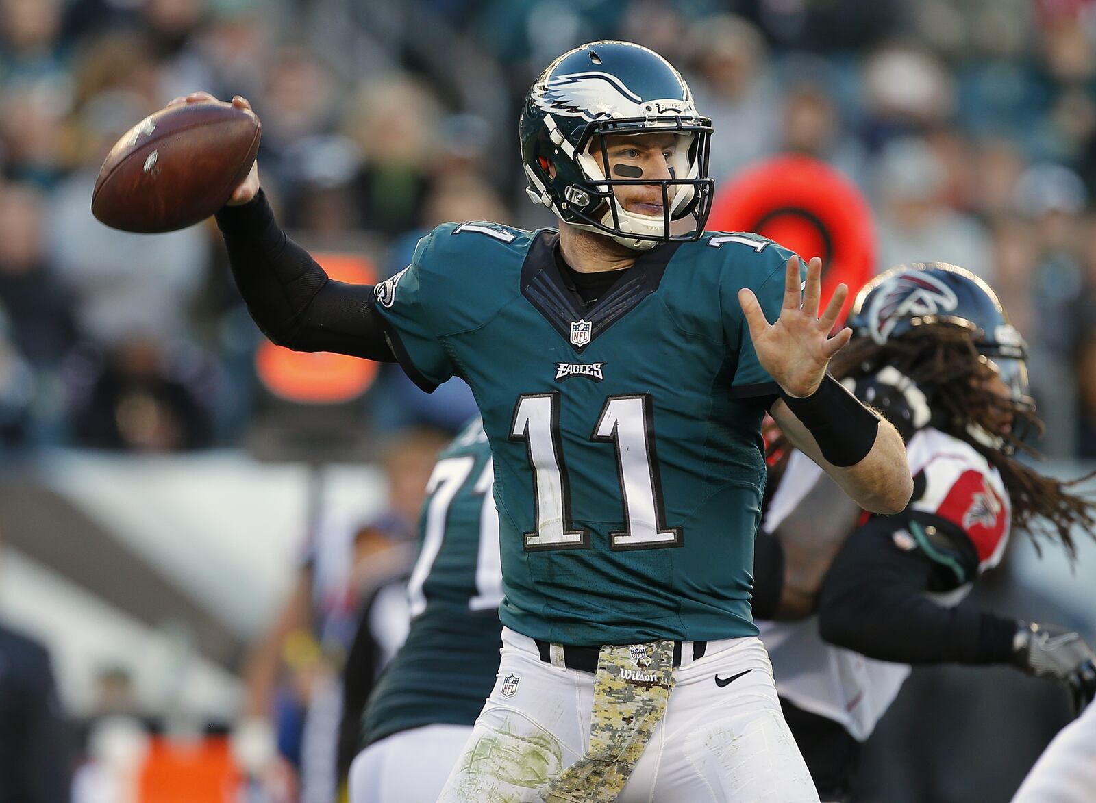 PHILADELPHIA, PA - NOVEMBER 13: Quarterback Carson Wentz #11 of the Philadelphia Eagles attempts a pass during the fourth quarter against the Atlanta Falcons during a game at Lincoln Financial Field on November 13, 2016 in Philadelphia, Pennsylvania. The Eagles defeated the Falcons 24-15. (Photo by Rich Schultz/Getty Images)