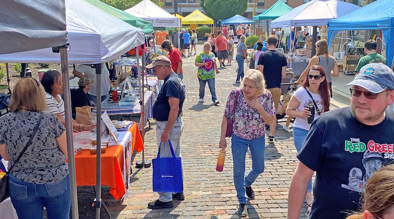 People turned out Saturday morning, June 17, 2023 for the Springfield Farmers Market located Market Street between COhatch and the Clark County Heritage Center. The Farmers Market offers a variety of fresh, local food and craft items. It is open every Saturday 9 AM -12:30 PM. BEN MCLAUGHLIN/STAFF