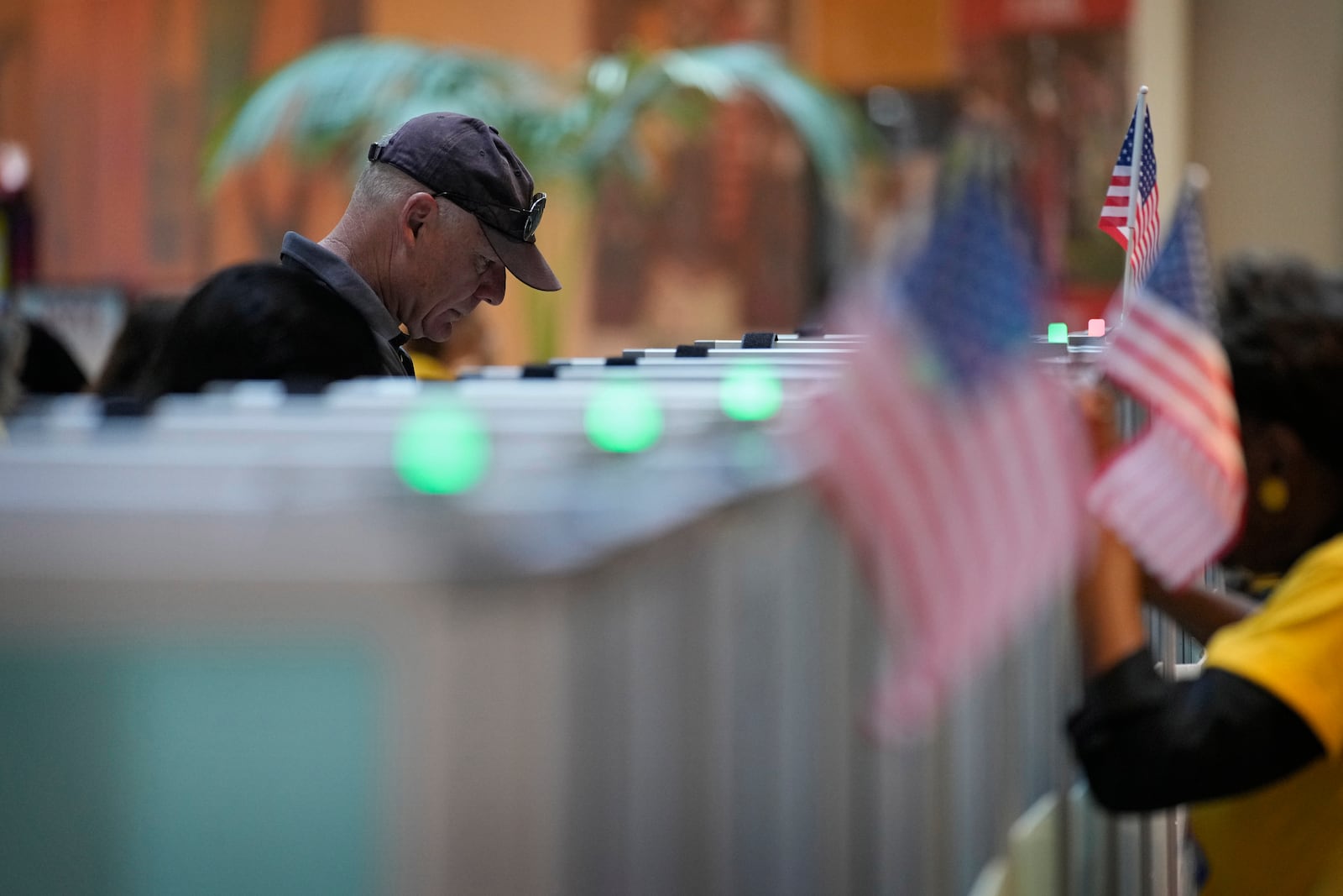 FILE - A person votes in the Nevada primary at a polling place, June 11, 2024, in Henderson, Nev. (AP Photo/John Locher, File)