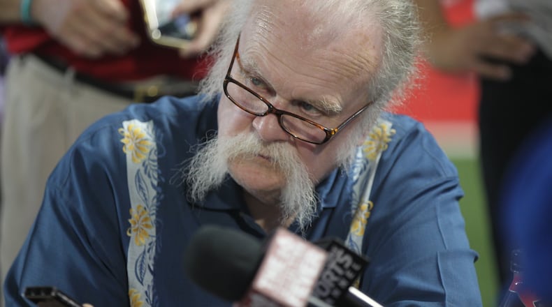 Tom Archdeacon talks to an Ohio State player at the Woody Hayes Athletic Center in Columbus in 2016.