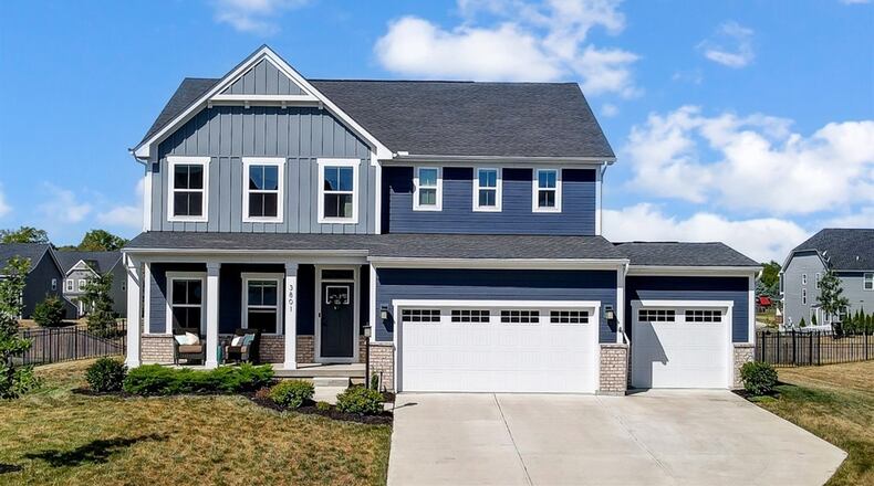 Listed for $607,000 by Coldwell Banker Heritage, the two-story frame home at 3801 Oak Creek Drive in Sugarcreek Twp. has about 3,960 square feet of living space including a finished basement and five bedrooms. CONTRIBUTED