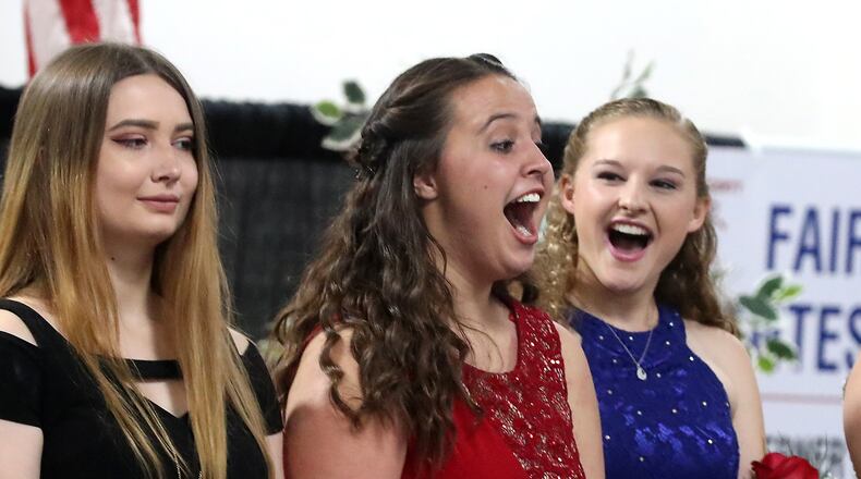 Emma Hardacre, center, reacts as her name is announced as the 2018 Clark County Fair Queen Saturday, July 21, 2018. Emma is from the Global Impact STEM Academy. Her mother was also a Clark County Fair Queen. BILL LACKEY/STAFF