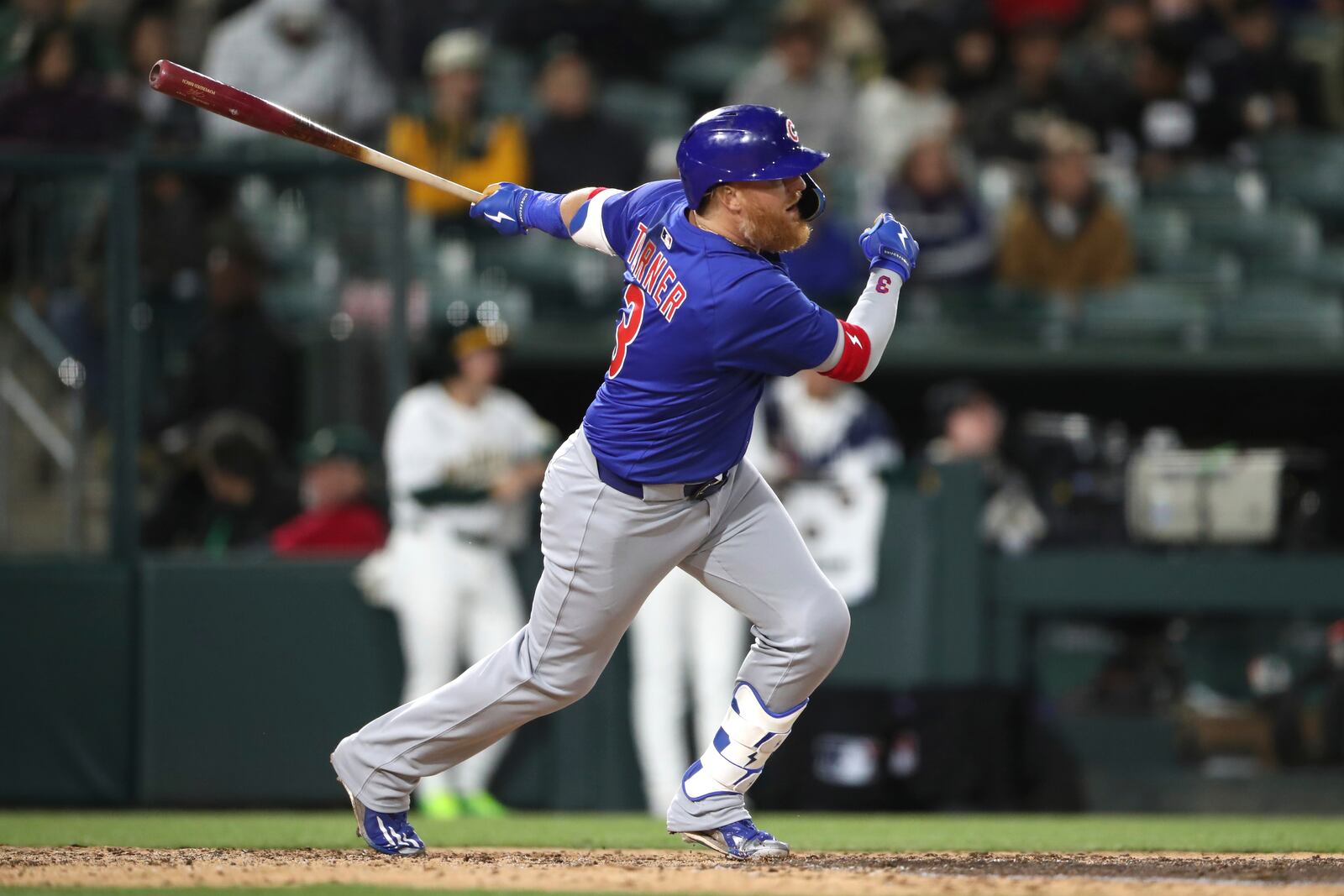 Chicago Cubs's Justin Turner hits an RBI single against the Athletics in the seventh inning of a baseball game Tuesday, April 1, 2025, in West Sacramento, Calif. (AP Photo/Scott Marshall)
