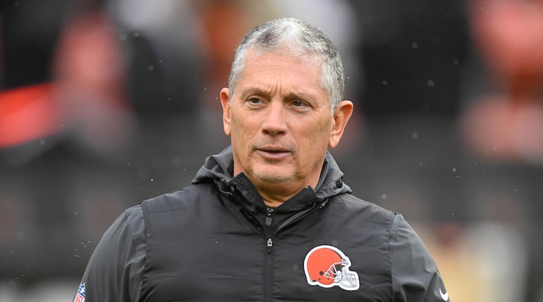 FILE - Cleveland Browns defensive coordinator Jim Schwartz walks on the field before an NFL football game against the Tennessee Titans in Cleveland, Dec. 7, 2025. (AP Photo/David Richard, File)