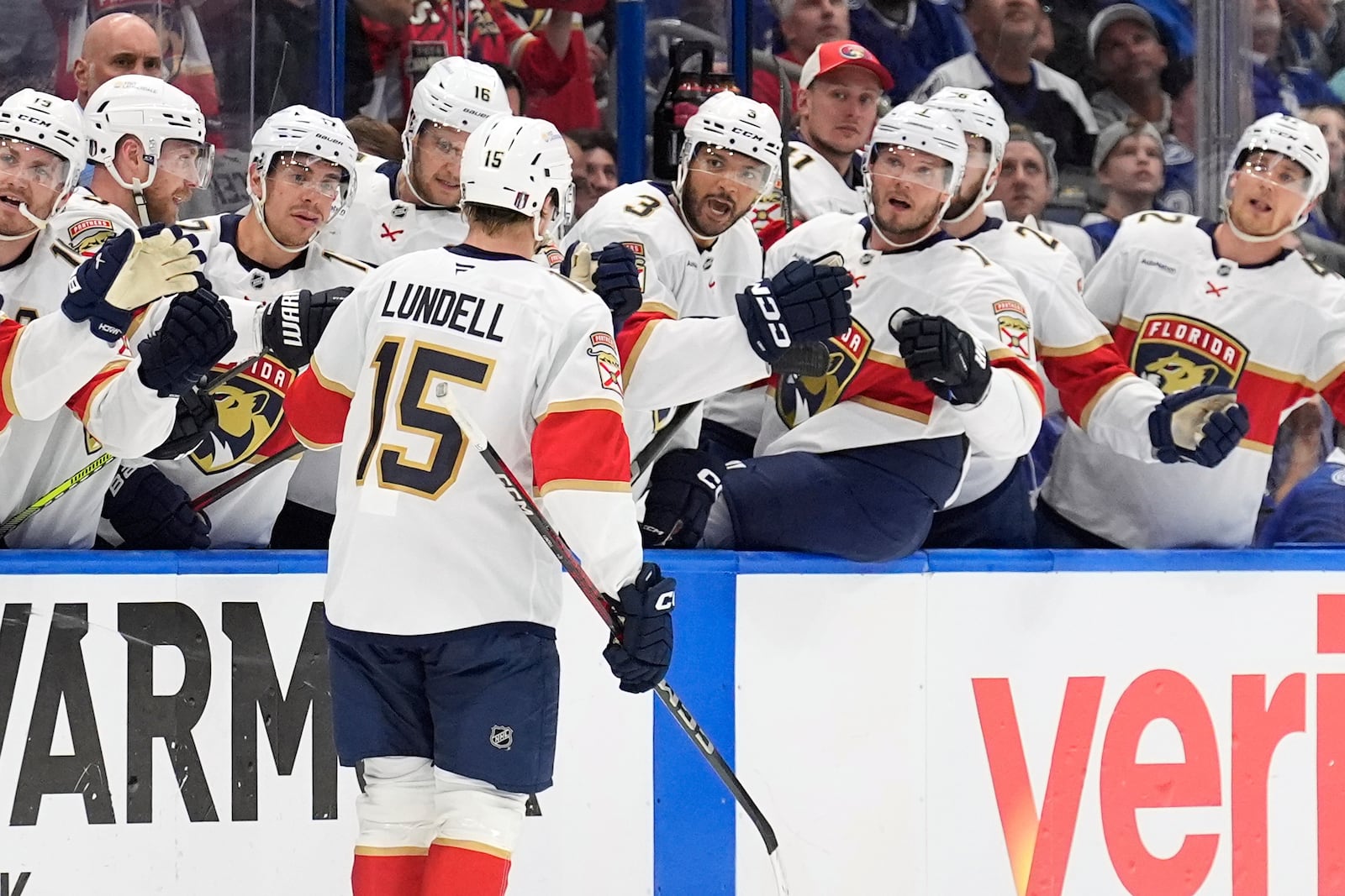 Florida Panthers center Anton Lundell (15) celebrates with the bench after scoring against the Tampa Bay Lightning during the first period in Game 5 of an NHL hockey Stanley Cup first-round playoff series, Wednesday, April 30, 2025, in Tampa, Fla. (AP Photo/Chris O'Meara)
