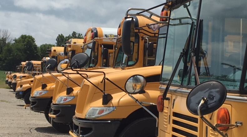 Graham Local Schools is considering changing their high school busing plans to pick up students from their homes, instead of at community stops.