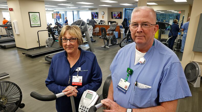 Mercy Health – Springfield/Urbana will host a Heart and Vascular Dinner and United Seniors Services will host a Heart Strong event for American Heart Month. In this file photo, Lisa McClure, supervisor of the Mercy Health Cardiac Rehab unit, and Dan Price, manager of the Mercy Health Cardiac Services, in the Cardiac Rehab unit at Springfield Regional Medical Center last year. BILL LACKEY/STAFF