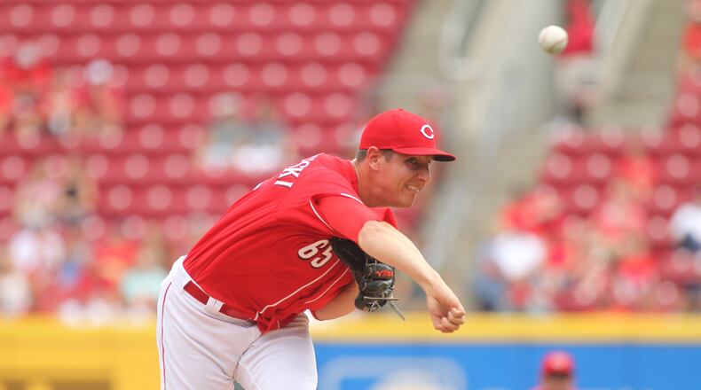 Reds reliever Asher Wojciechowski pitches against the Nationals on Monday, July 17, 2017, at Great American Ball Park in Cincinnati. David Jablonski/Staff