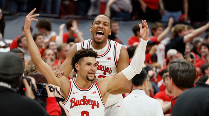 Ohio State's Tanner Holden, front, celebrates his game-winning basket against Rutgers with Zed Key during an NCAA college basketball game on Thursday, Dec. 8, 2022, in Columbus, Ohio. (AP Photo/Jay LaPrete)