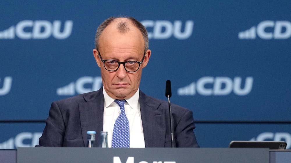 German Chancellor Friedrich Merz, CDU party chairman, attends the CDU federal party conference, in Stuttgart, Germany, Friday Feb. 20, 2026. (Kay Nietfeld/dpa via AP)