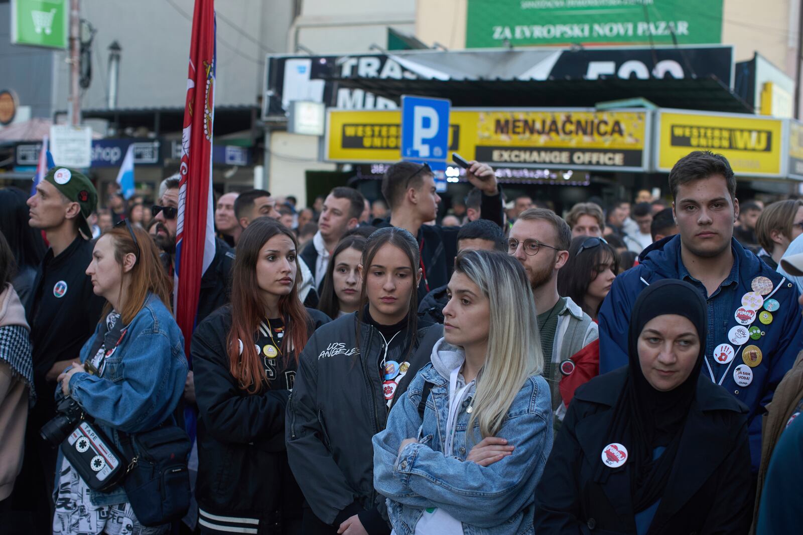 People observe seventeen minutes of silence during an anti-corruption protest led by university students in the southwestern town of Novi Pazar, Serbia, Saturday, April 12, 2025. (AP Photo/Marko Drobnjakovic)