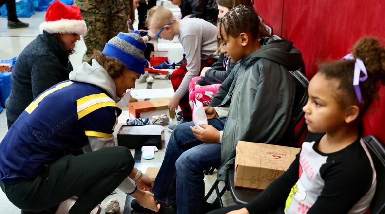 The Springfield City School District held a Holiday Extravaganza at Horace Mann Elementary School, where more than 200 students were given new shoes and socks from Shoes 4 The Shoeless, as well as other items and a visit from Santa and Mrs. Claus. Contributed