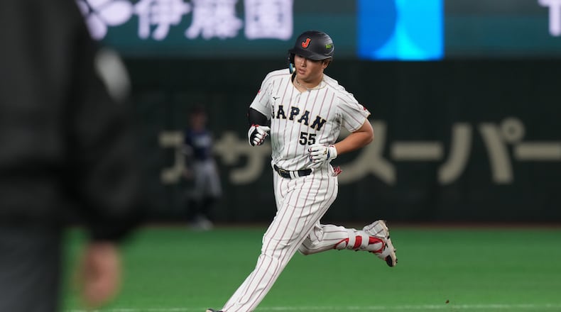 Japan's Munetaka Murakami runs for his grand slam home run during the eighth inning of a World Baseball Classic game between Japan and the Czech Republic on Tuesday, March 10, 2026 in Tokyo. (AP Photo/Eugene Hoshiko)