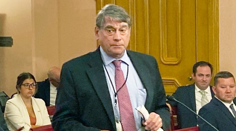 FILE—State Rep. Bill Seitz, a Cincinnati Republican, speaks on legislation in this Sept. 22, 2021 file photo taken at the Ohio Statehouse in Columbus, Ohio. Seitz said concerns raised on a rewrite of Ohio's election laws that includes both new restrictions on voting and some added conveniences long supported by voting rights advocates, will not be ready for 2022 elections. (AP Photo/Andrew Welsh-Huggins, File)