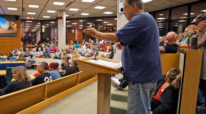Mark Sanders addresses the Springfield City Commission about what he described as an immigrant crisis in the city during a September meeting. BILL LACKEY/STAFF
