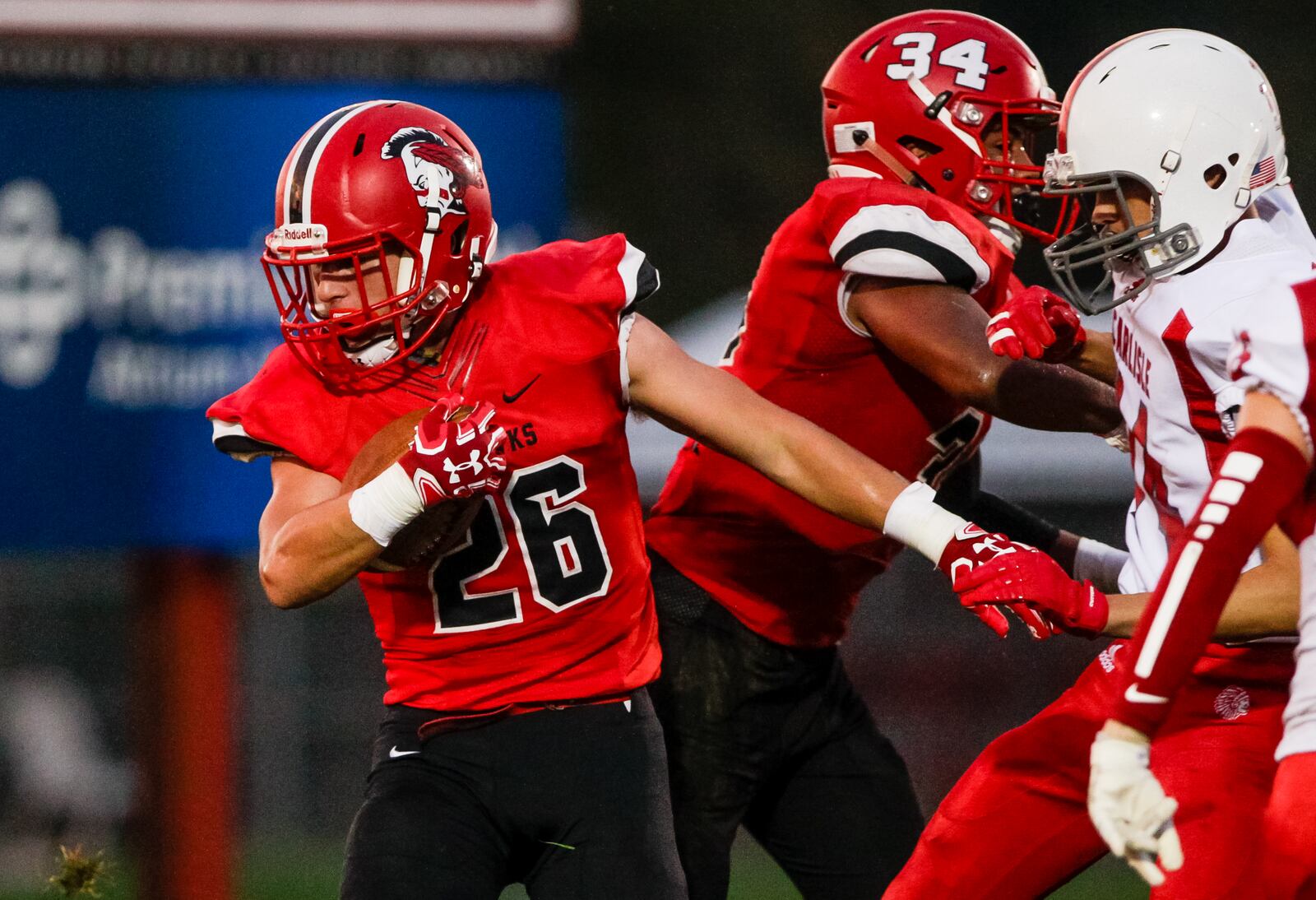 Madison’s Cameron Svarda carries the ball during their 54-0 win over Carlisle Friday, Oct. 5, 2018, at Madison High School’s Brandenburg Field. NICK GRAHAM/STAFF