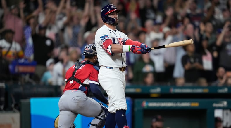 United States designated hitter Kyle Schwarber hits a home run during the fifth inning of a World Baseball Classic game against Britain, Saturday, March 7, 2026, in Houston. (AP Photo/Ashley Landis)