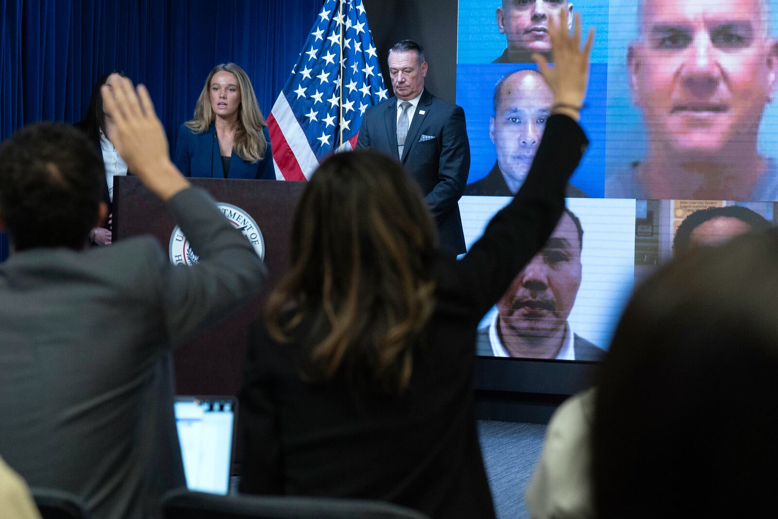 DHS Assistant Secretary for Public Affairs Tricia McLaughlin flanked by Acting director of U.S. Immigration and Customs Enforcement Todd Lyons speaks during a news conference at ICE Headquarters, in Washington, Wednesday, May 21, 2025. (AP Photo/Jose Luis Magana)