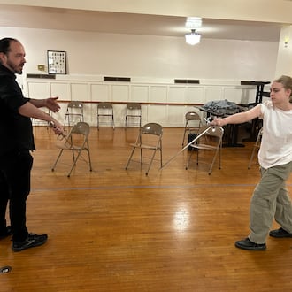 Jaicie Graham, right, rehearses sword fighting with Daniel Morgan for the Showtime Performing Arts production of the Shakespeare classic "Romeo and Juliet" on Friday, Feb. 20 and Saturday, Feb. 21 at the Springfield Metropolis. CONTRIBUTED
