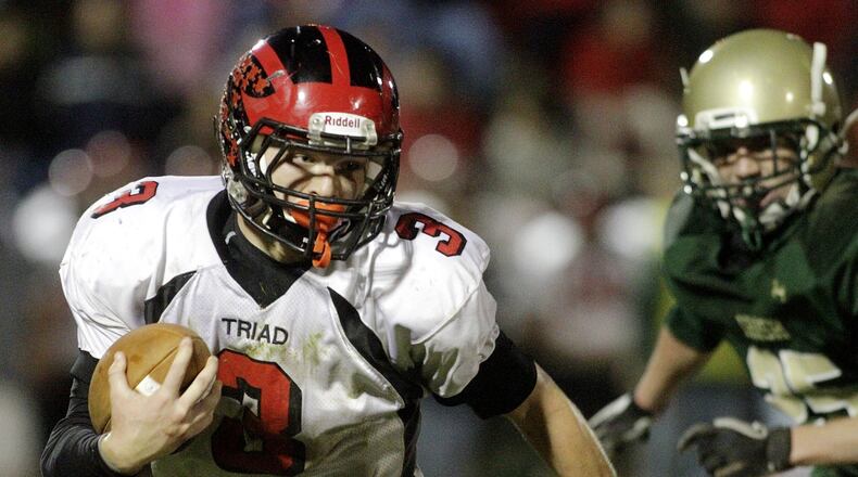 The Triad High School football team has remained unbeaten at 11-0 despite the loss of key player Tre McIntyre (left) to injury. Staff Photo by Barbara J. Perenic