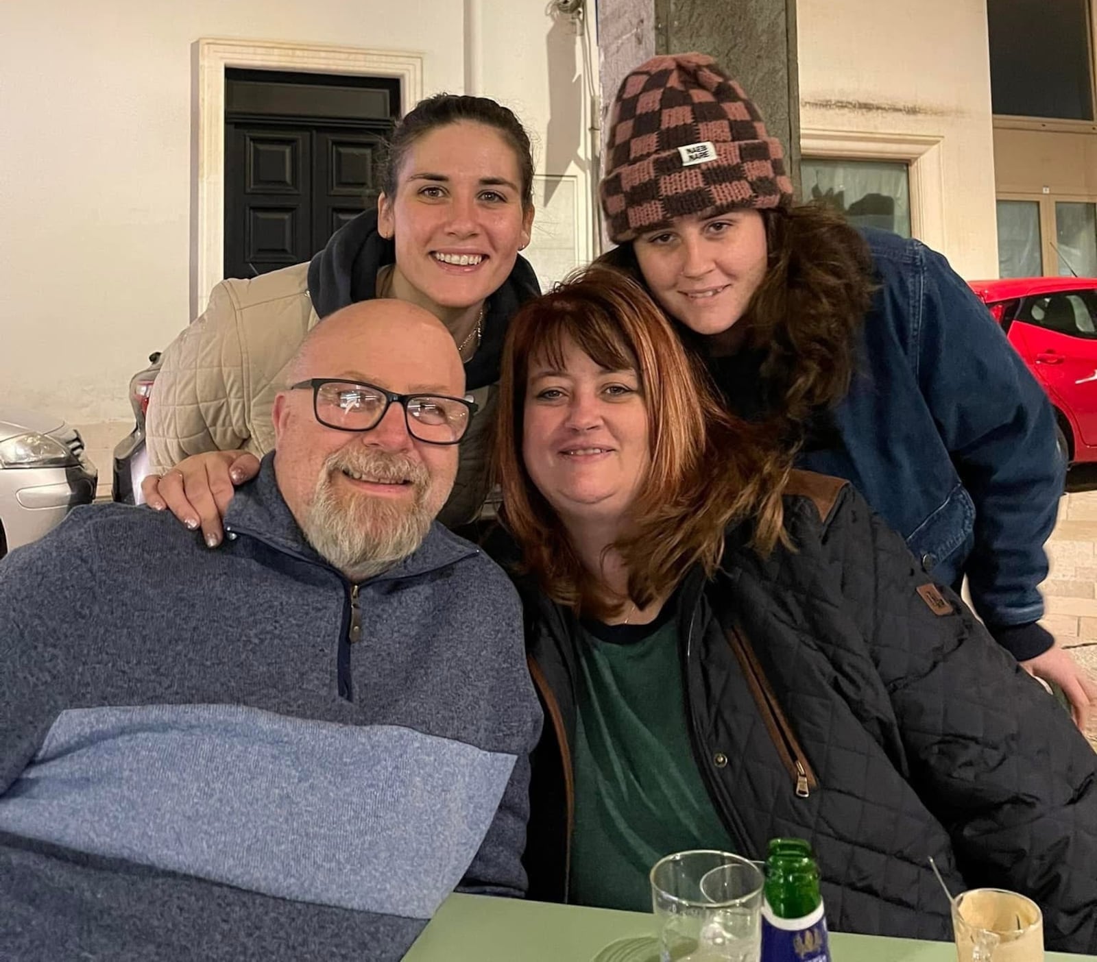 Franco (bottom left) and Karen Gallo (bottom right) with their daughters, Jess and Alexa, own Franco the Foodie in New Carlisle. KAREN GALLO / CONTRIBUTED.