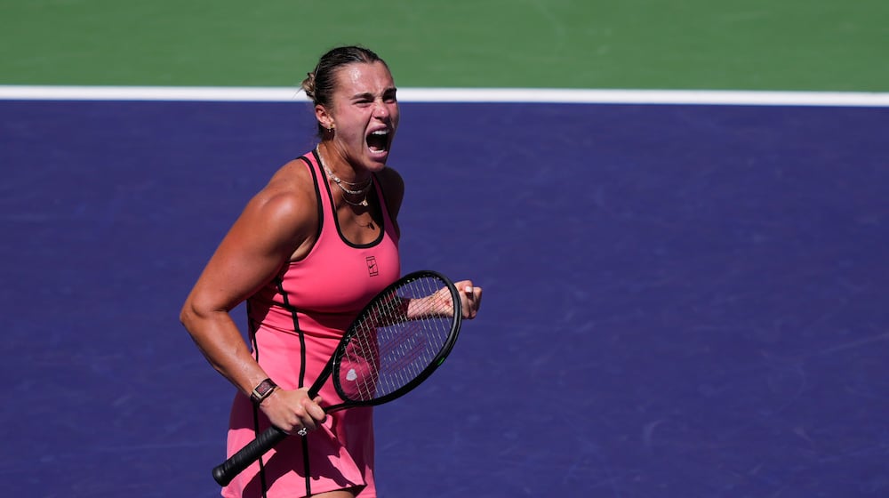 Aryna Sabalenka, of Belarus, reacts after winning a point against Elena Rybakina, of Kazakhstan, during a final match at the BNP Paribas Open tennis tournament Sunday, March 15, 2026, in Indian Wells, Calif. (AP Photo/Mark J. Terrill)