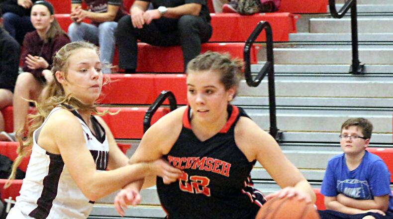 Tecumseh junior Corinne Thomas (with ball) was named to the D-I All-Southwest District girls basketball first team. GREG BILLING / CONTRIBUTED