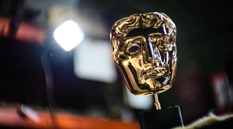 A completed British Academy Film Awards mask sits on a workbench at the FSE Foundry in Braintree, England on Tuesday, Feb. 10, 2026. (Scott A Garfitt/Invision/AP)