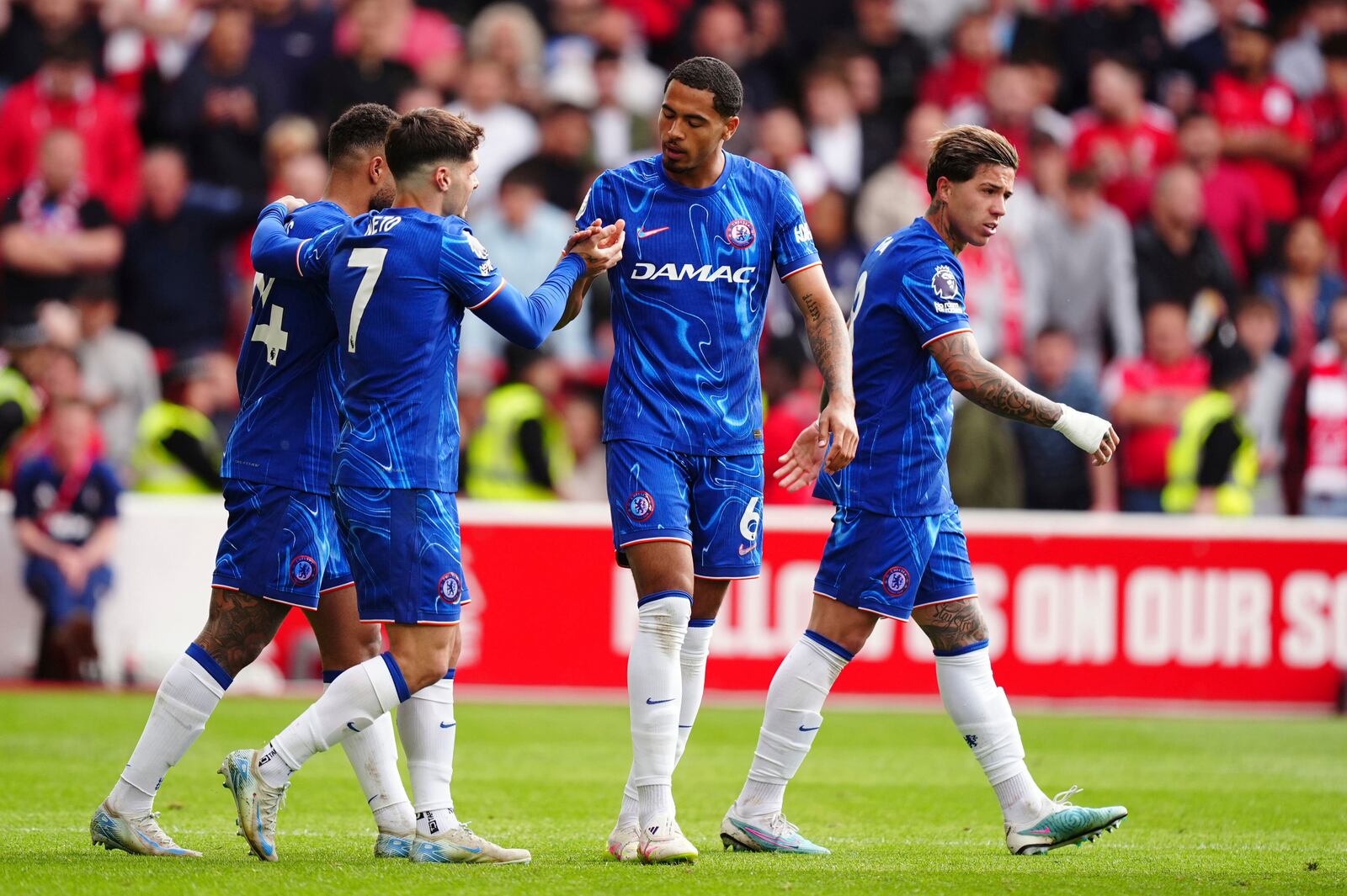 Chelsea's Levi Colwill, centre right, celebrates scoring the opening goal during the Premier League match at the City Ground, Nottingham, England, Sunday May 25, 2025. (Mike Egerton/PA via AP)