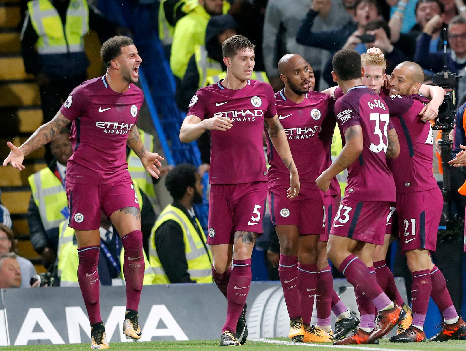 FILE - Manchester City's scorer Kevin De Bruyne, second right, and his teammates celebrate the opening goal during their English Premier League soccer match between Chelsea and Manchester City at Stamford Bridge stadium in London, Saturday, Sept. 30, 2017. (AP Photo/Frank Augstein, file)