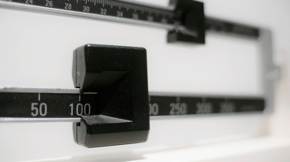 FILE - This April 3, 2018 file photo shows a closeup of a beam scale in New York. (AP Photo/Patrick Sison, File)